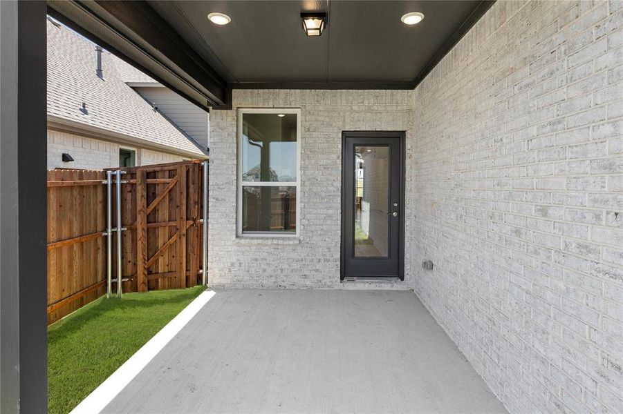 Exterior details and patio area of a home in Edgewater, Fate (Image 4). Exterior details and patio area of a home in Edgewater, Fate (Image 4).