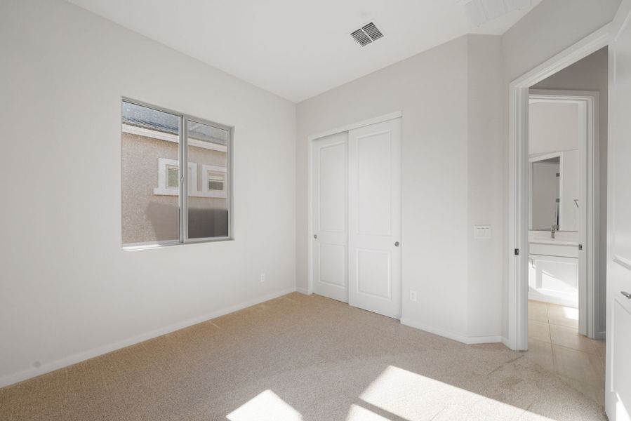 Spacious, unfurnished interior of a new home in Legado West, Queen Creek (Image 27).