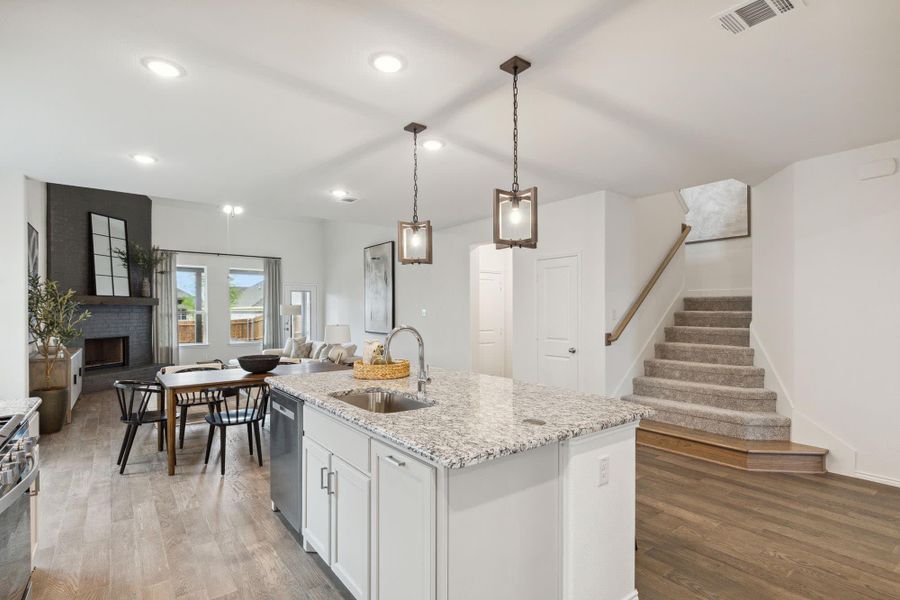 Kitchen to Family Room | Concept 3106 at Redden Farms - Classic Series in Midlothian, TX by Landsea Homes