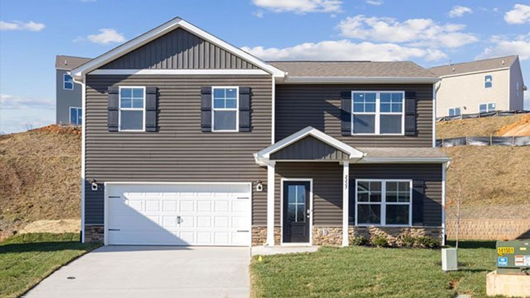 Front exterior of a new home in Polo Fields, Kingsport, TN, highlighting curb appeal (Image 2).