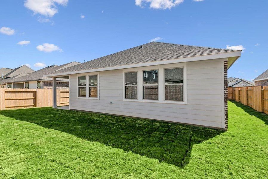 Exterior details and patio area of a home in Oakwood Estates, Waller (Image 2). Exterior details and patio area of a home in Oakwood Estates, Waller (Image 2).