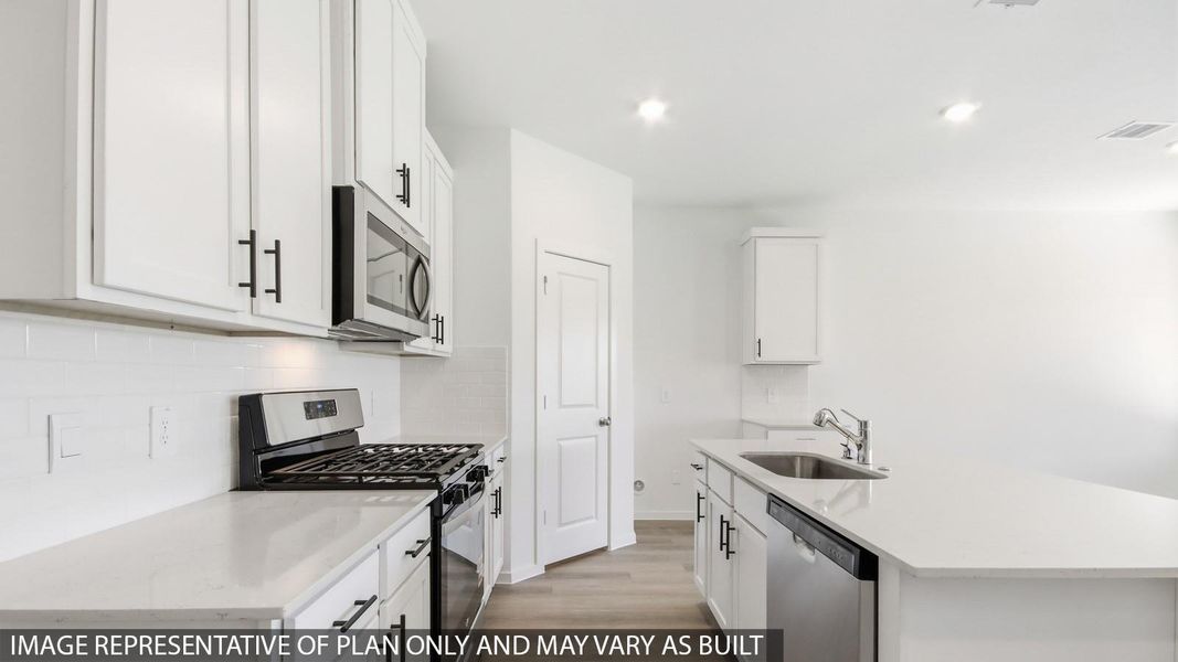 Furnished interior view inside a new home in New Waverly Station, New Waverly (Image 5).