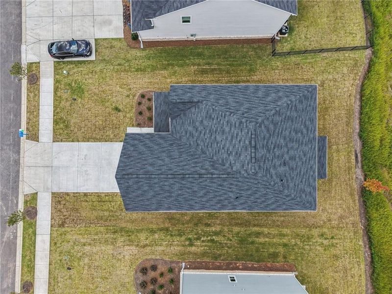 Exterior details and patio area of a home in The Hills at Cedar Creek, Winder (Image 25).