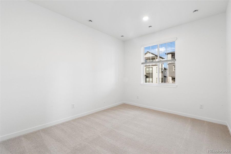 Spacious, unfurnished interior of a new home in Sterling Ranch Apex Collection, Littleton (Image 21).