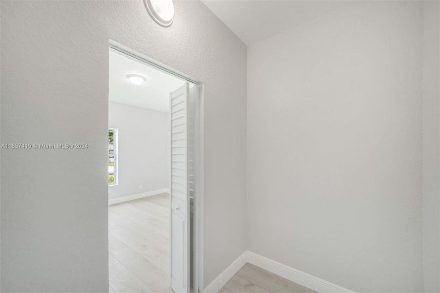 Primary Bedroom Walk in Closet