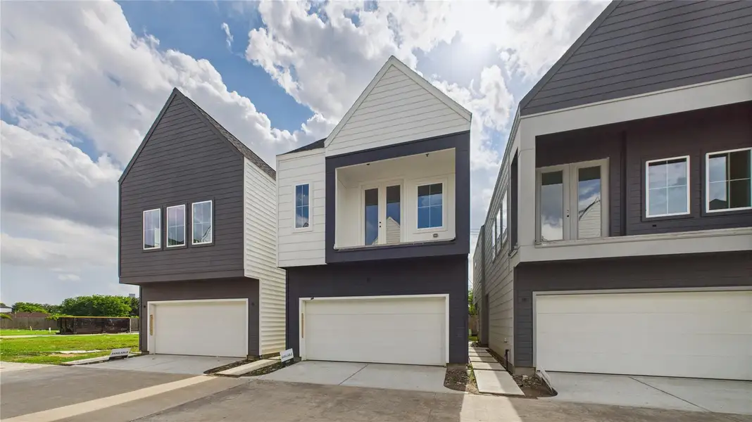 This thoughtfully designed two-story residence offers the perfect blend of modern living and practical layout. The second floor features an open-concept living, dining, and kitchen area, creating a seamless flow ideal for entertaining. Expansive windows and direct access to a private balcony from the living room invite natural light and fresh air, enhancing the indoor-outdoor experience. This thoughtfully designed two-story residence offers the perfect blend of modern living and practical layout. The second floor features an open-concept living, dining, and kitchen area, creating a seamless flow ideal for entertaining. Expansive windows and direct access to a private balcony from the living room invite natural light and fresh air, enhancing the indoor-outdoor experience.