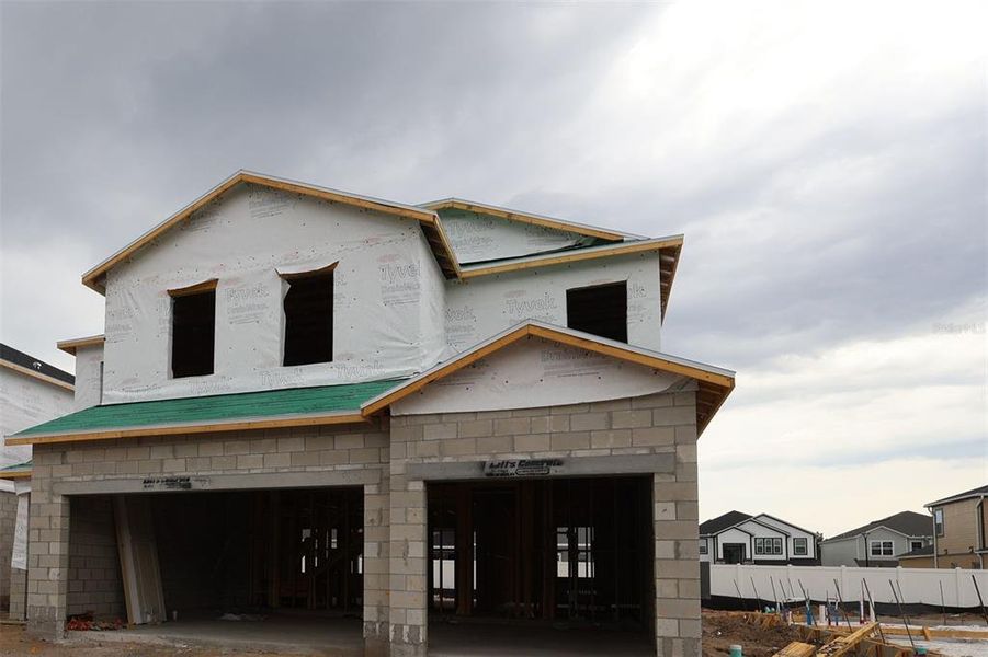 In-progress construction of a new home in Estates at Rivercrest, Sanford, FL (Image 12).