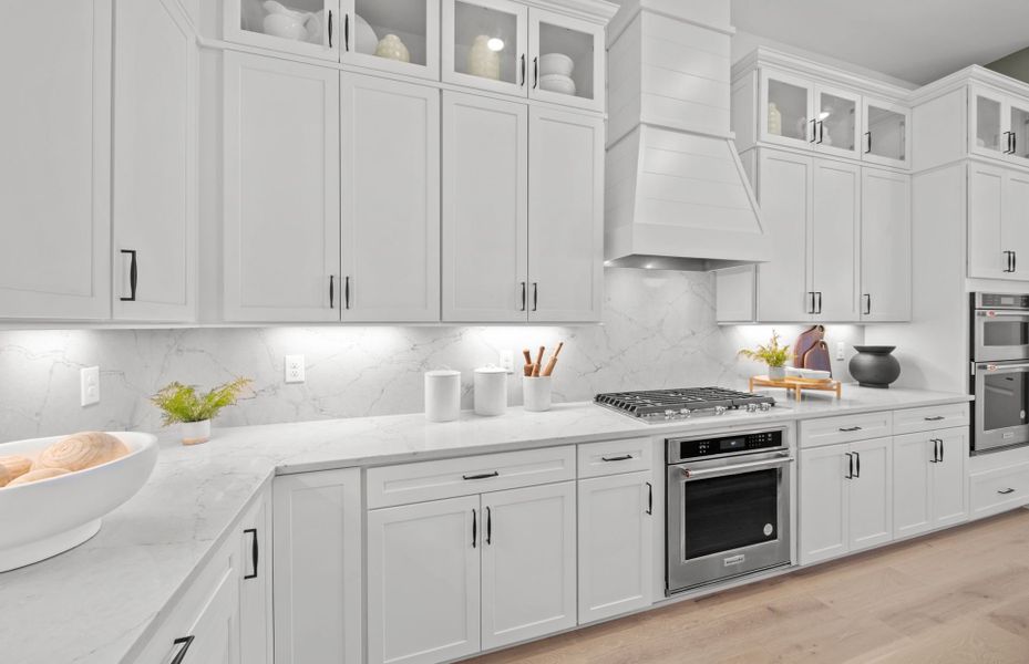 Representative furnished interior of a home built from the Layton Grande by DiVosta in BeachWalk by Manasota Key, Englewood (Image 14).