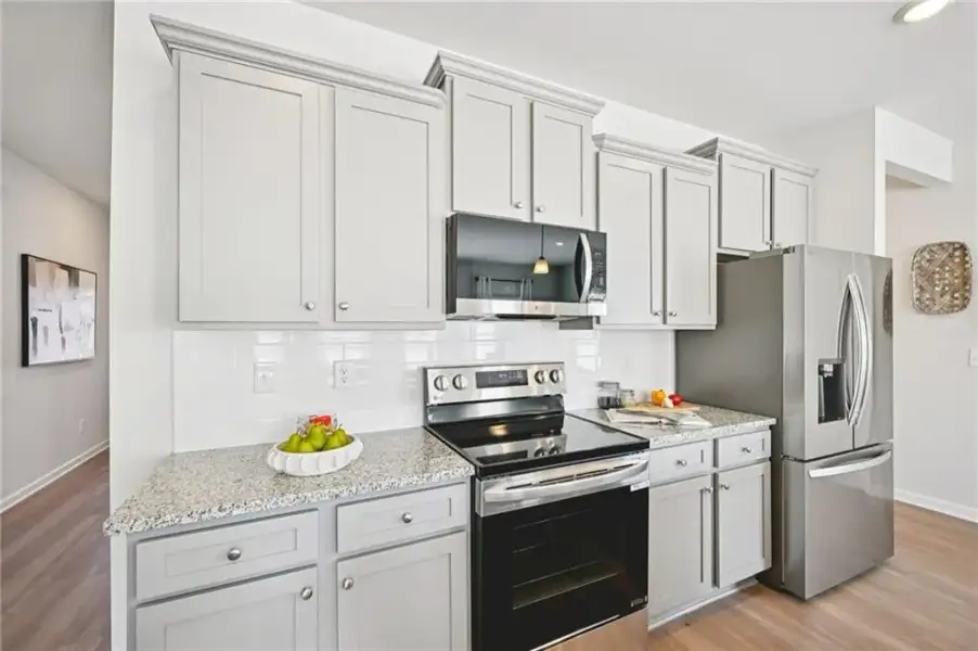 Furnished interior view inside a new home in Cash's Crossing, Ellenwood (Image 8).