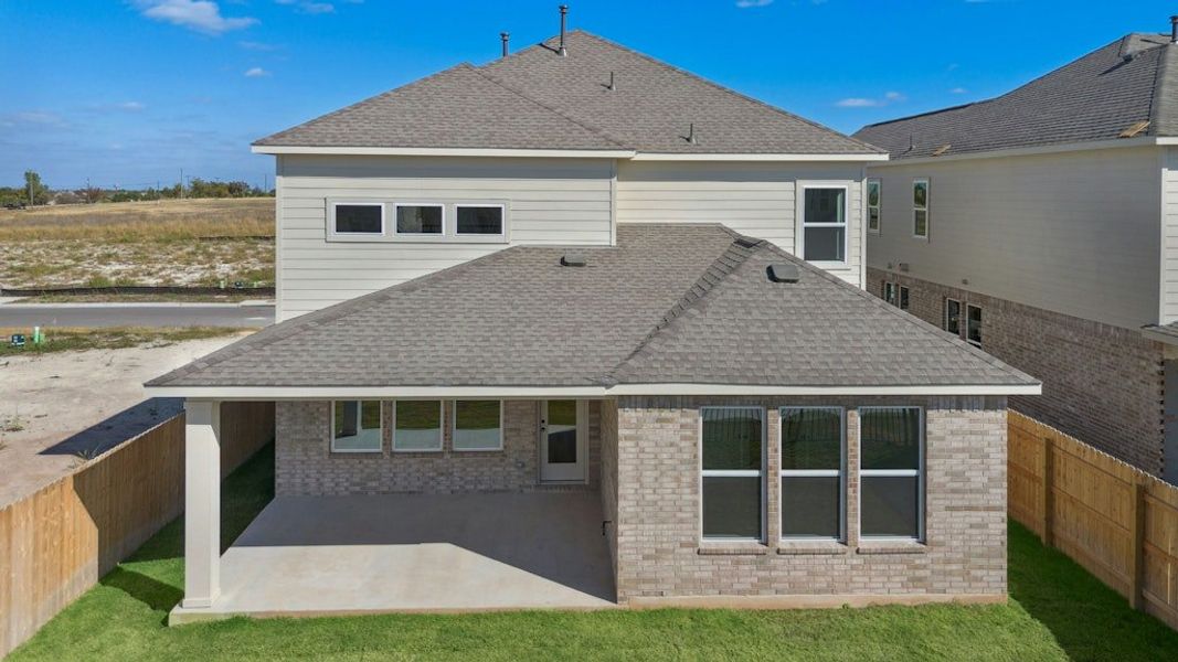 Exterior details and patio area of a home in University Heights, Round Rock (Image 22).