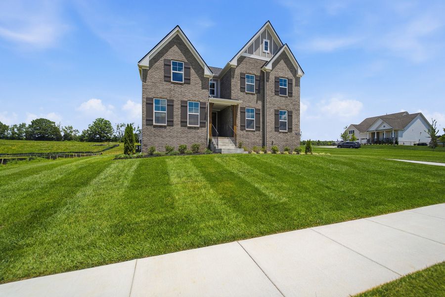 Front exterior of a new home in Aden Woods, Fairview, TN, highlighting curb appeal (Image 28).