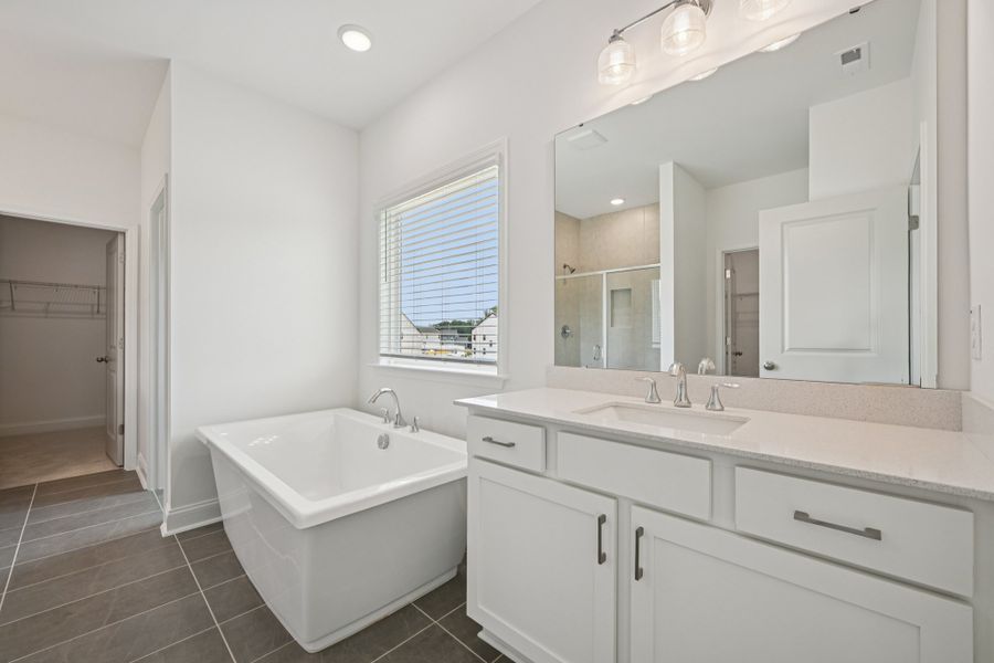 Representative furnished interior of a home built from the Jordan by Ashton Woods in Rowland's Grant, Fuquay Varina (Image 28).
