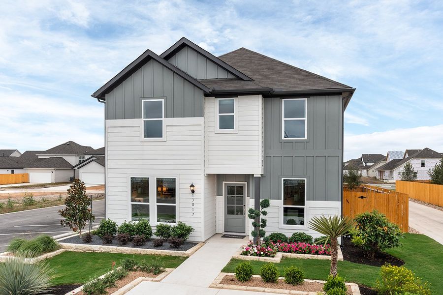 Representative exterior photo of a completed home built from the Bruckner 2 by Taylor Morrison in Longview 40s - Alley, Del Valle, TX (Image 1). Representative exterior photo of a completed home built from the Bruckner 2 by Taylor Morrison in Longview 40s - Alley, Del Valle, TX (Image 1).