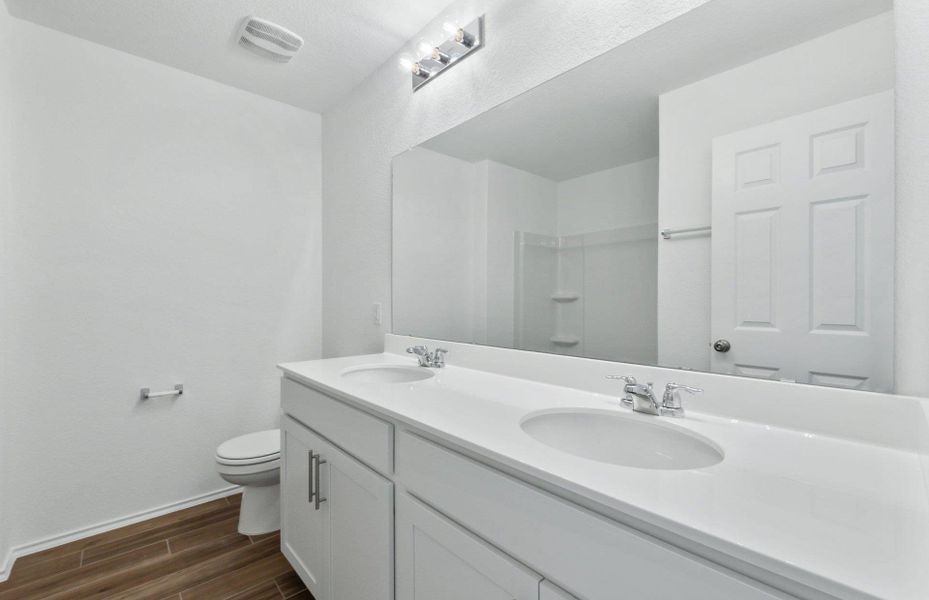 Furnished interior view inside a new home in Santa Rita Ranch, Liberty Hill (Image 6). Furnished interior view inside a new home in Santa Rita Ranch, Liberty Hill (Image 6).