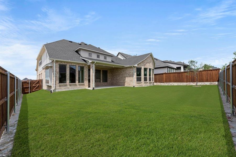 Exterior details and patio area of a home in Hillside Village, Celina (Image 2).
