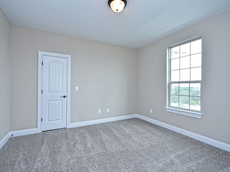 Representative unfurnished interior of a home built from the Madera II by Giddens Homes in Scofield Farms Estates, Georgetown (Image 361).