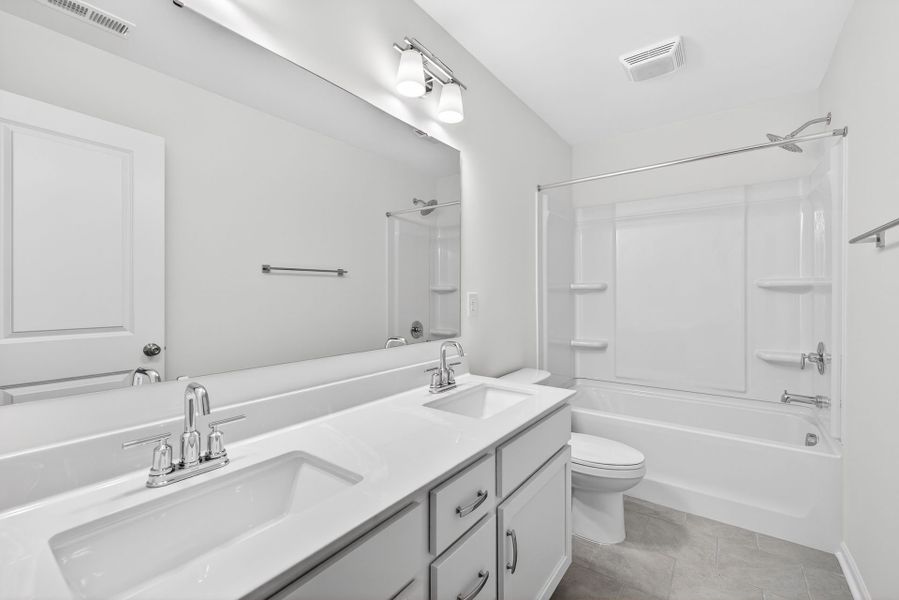 Furnished interior view inside a new home in Grandview, Albemarle (Image 10). Furnished interior view inside a new home in Grandview, Albemarle (Image 10).