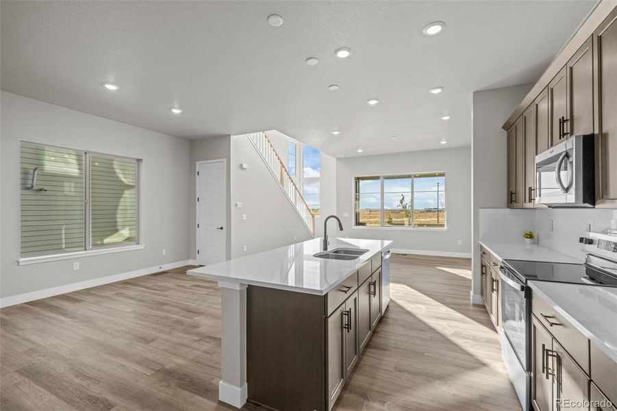 Furnished interior view inside a new home in Painted Prairie, Aurora (Image 8). Furnished interior view inside a new home in Painted Prairie, Aurora (Image 8).