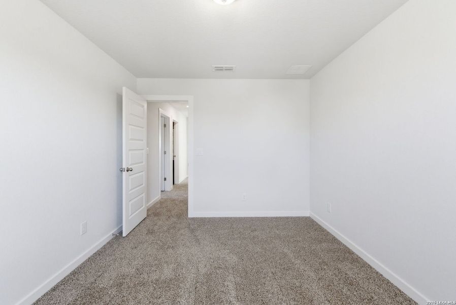 Spacious, unfurnished interior of a new home in Talley Fields, San Antonio (Image 33).