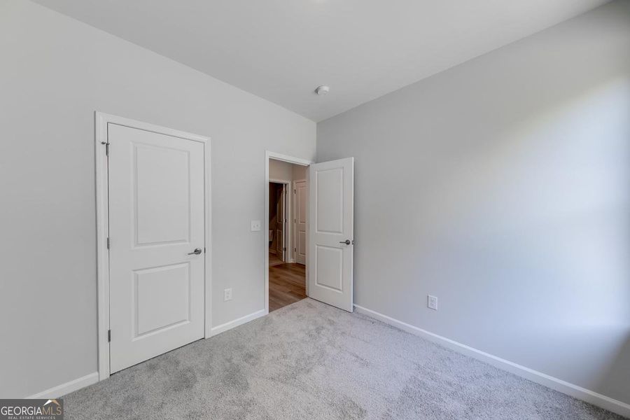 Spacious, unfurnished interior of a new home in Chimney Oaks Townhomes, Homer (Image 25). Spacious, unfurnished interior of a new home in Chimney Oaks Townhomes, Homer (Image 25).