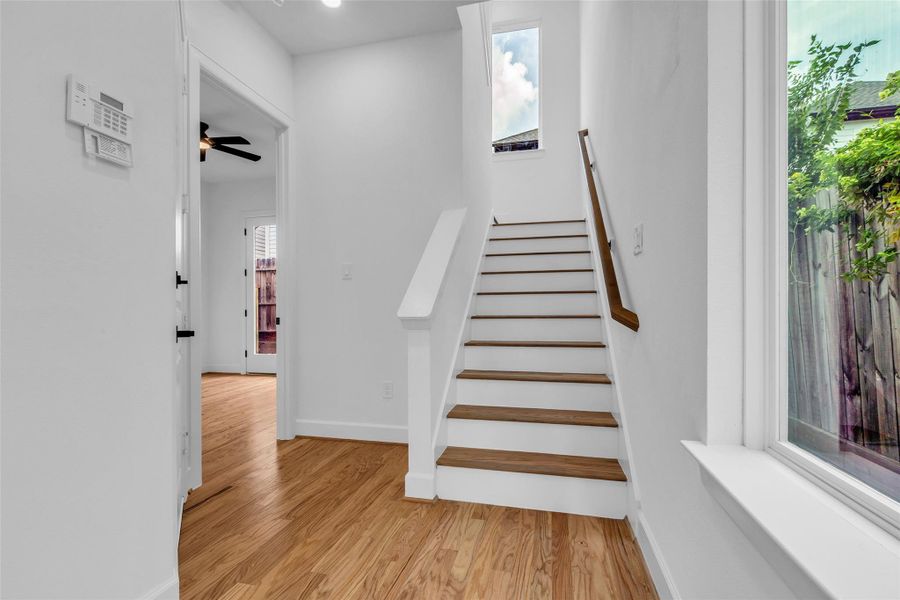 Step into this inviting entryway, where bright, durable engineered wood floors greet you with warmth and elegance. Step into this inviting entryway, where bright, durable engineered wood floors greet you with warmth and elegance.