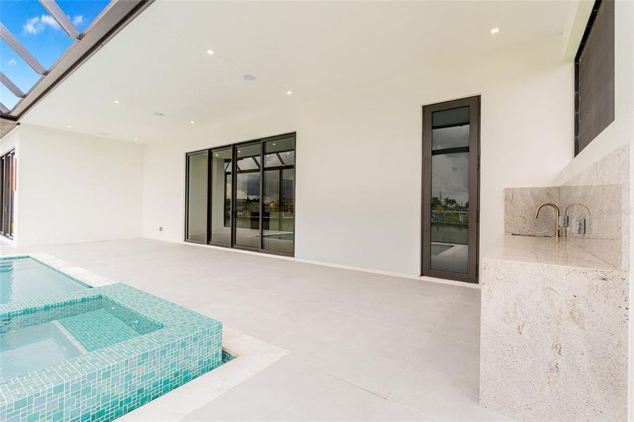 Exterior details and patio area of a home in , Port Charlotte (Image 39).