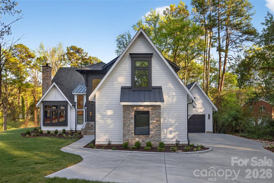Front exterior of a new home in , Charlotte, NC, highlighting curb appeal (Image 25).