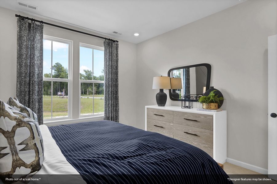 Furnished interior view inside a new home in Grand Park, Leland (Image 15). Furnished interior view inside a new home in Grand Park, Leland (Image 15).