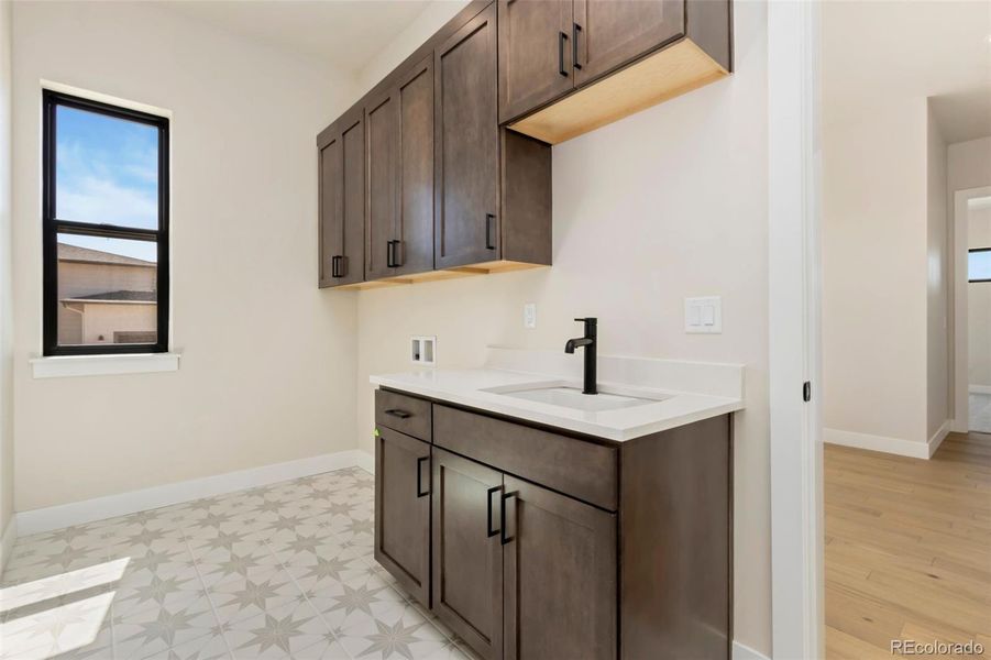 Furnished interior view inside a new home in Acadia at RainDance, Windsor (Image 3).
