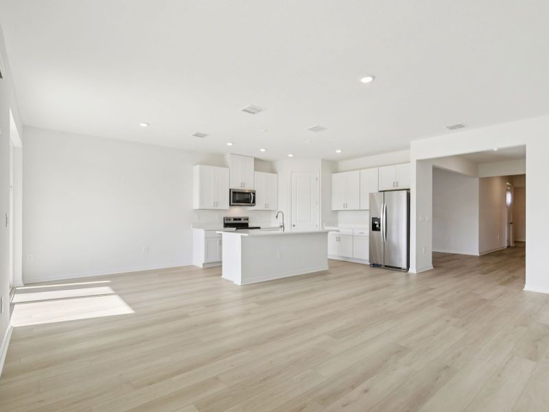 Spacious, unfurnished interior of a new home in Coasterra - Reserve Series, Palmetto (Image 13).