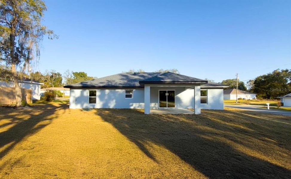 Exterior details and patio area of a home in , Ocala (Image 2).
