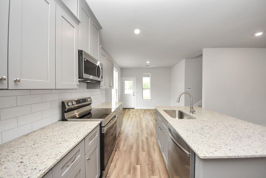 Furnished interior view inside a new home in The Enclave at Spring Branch, Conroe (Image 6).