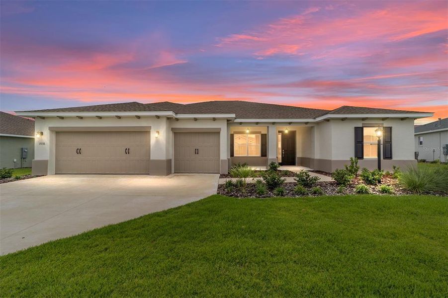 Front exterior of a new home in On Top of the World Communities, Ocala, FL, highlighting curb appeal (Image 20).