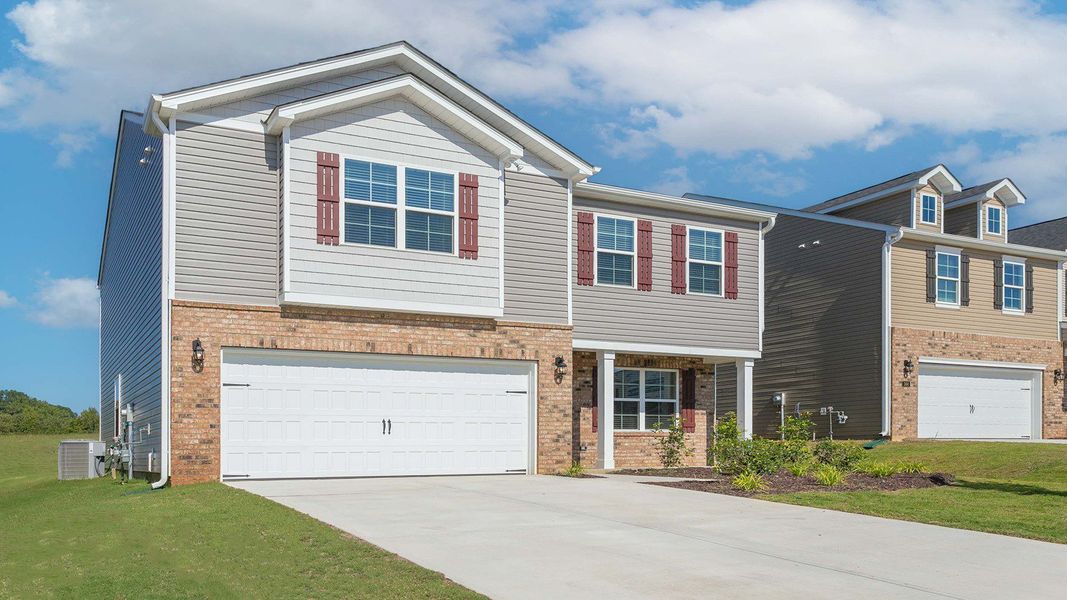 Front exterior of a new home in Bryson Park, Lexington, NC, highlighting curb appeal (Image 2). Front exterior of a new home in Bryson Park, Lexington, NC, highlighting curb appeal (Image 2).