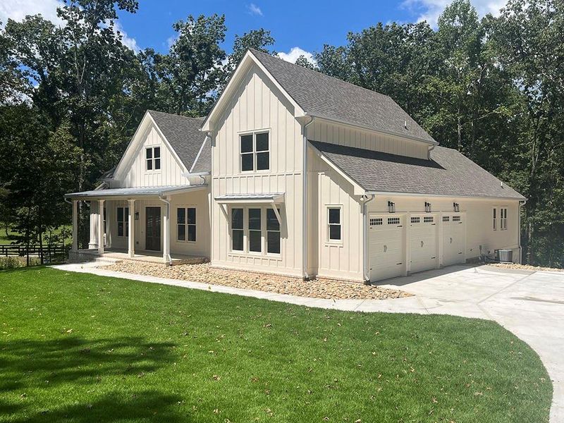 Front exterior of a new home in , Canton, GA, highlighting curb appeal (Image 28). Front exterior of a new home in , Canton, GA, highlighting curb appeal (Image 28).