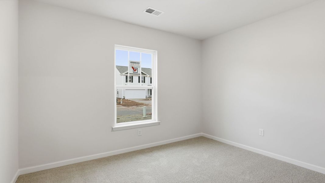 Spacious, unfurnished interior of a new home in Bentley Park, Greenwood (Image 16).
