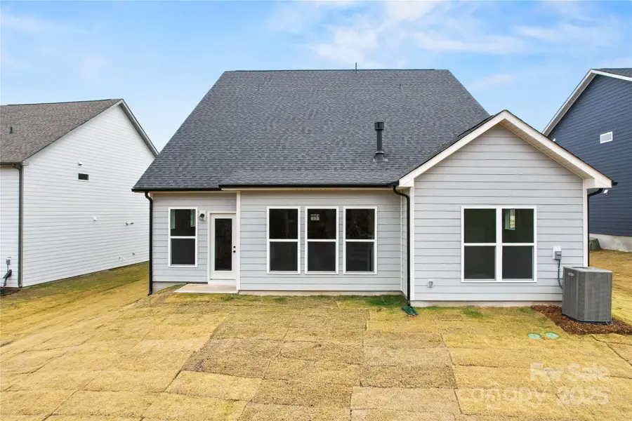 Exterior details and patio area of a home in Forest Creek, Waxhaw (Image 3).