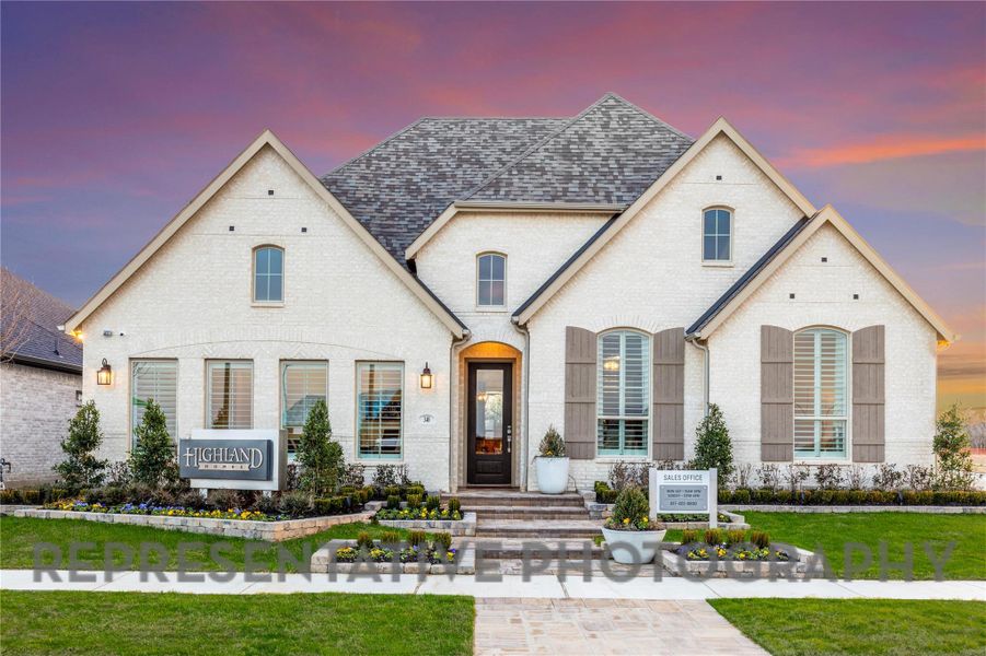 View of front facade featuring brick siding and a front lawn View of front facade featuring brick siding and a front lawn