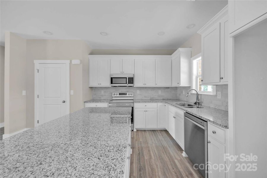 Furnished interior view inside a new home in , Mocksville (Image 11).