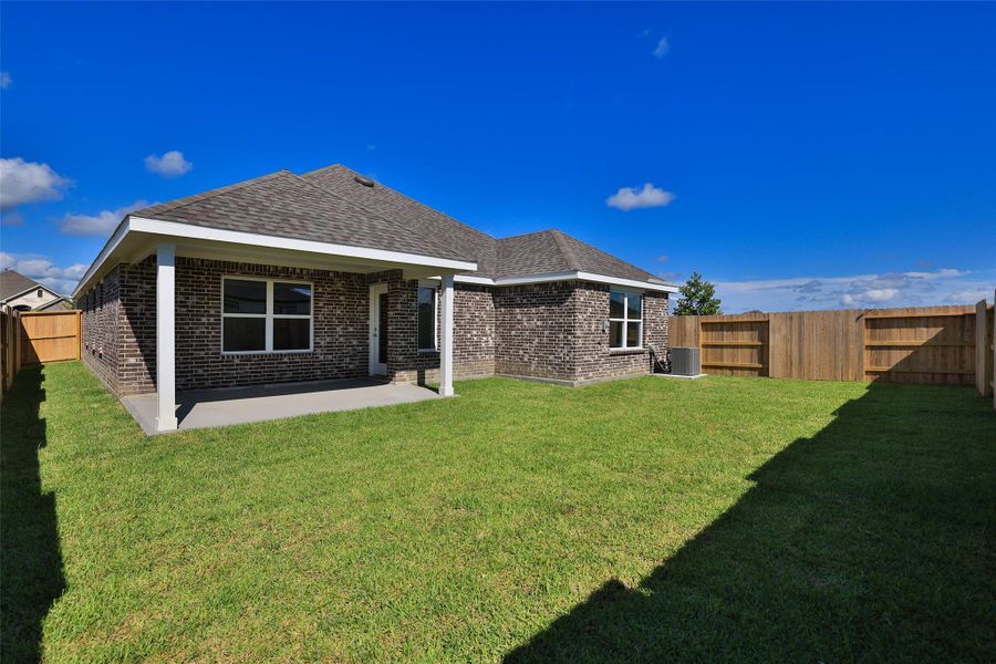 Exterior details and patio area of a home in River Ranch, Dayton (Image 3).
