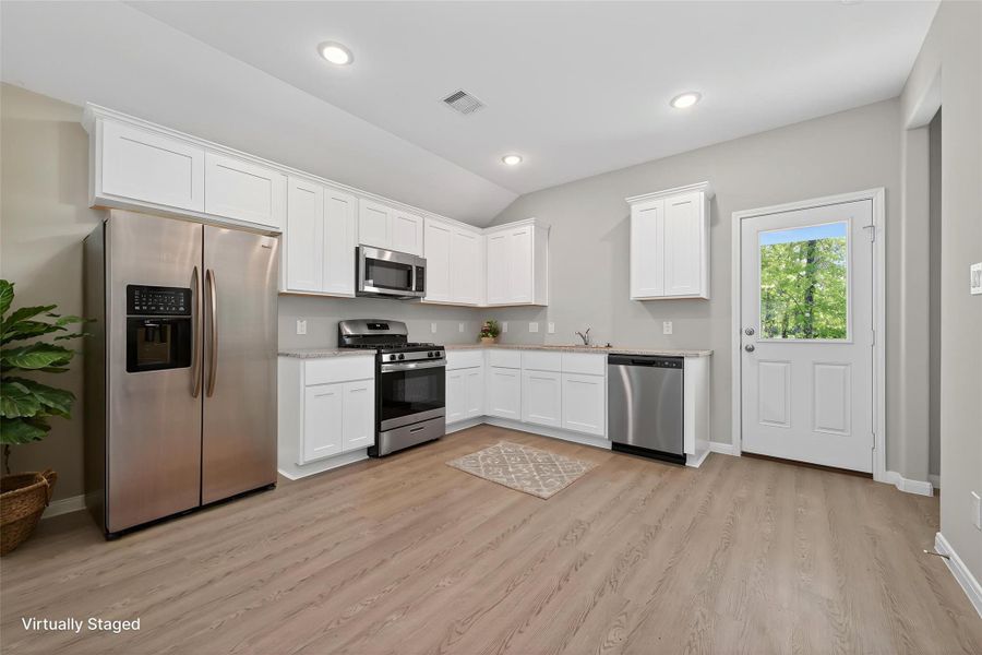 VIRTUALLY STAGED. Refrigerator not included.