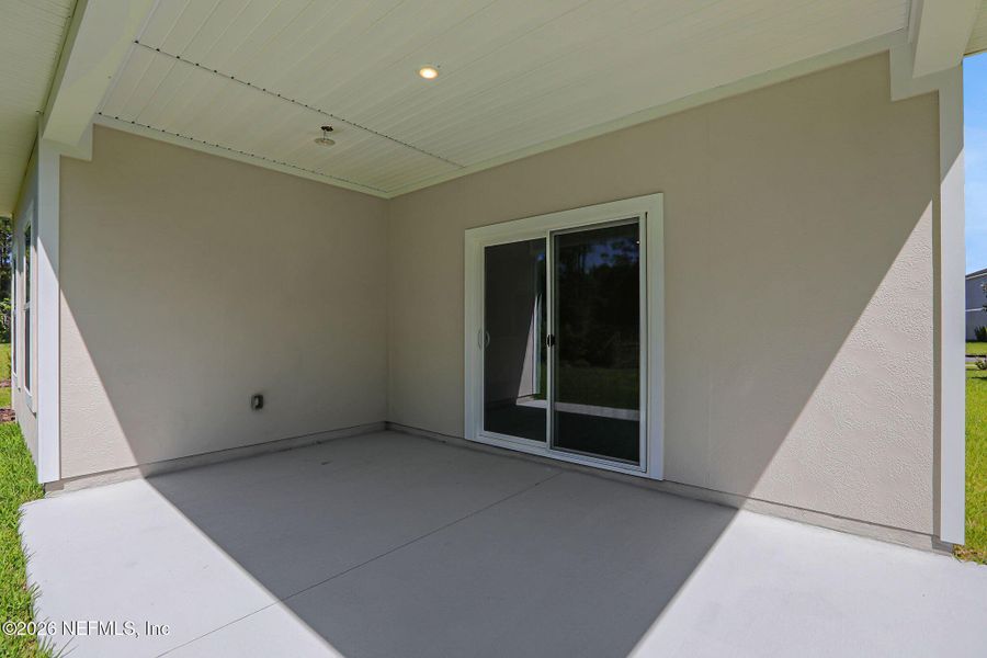 Exterior details and patio area of a home in Amberly, Green Cove Springs (Image 26).