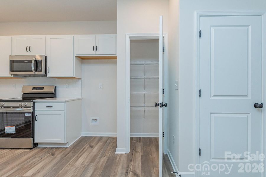 Furnished interior view inside a new home in Country Club Village, Salisbury (Image 9).