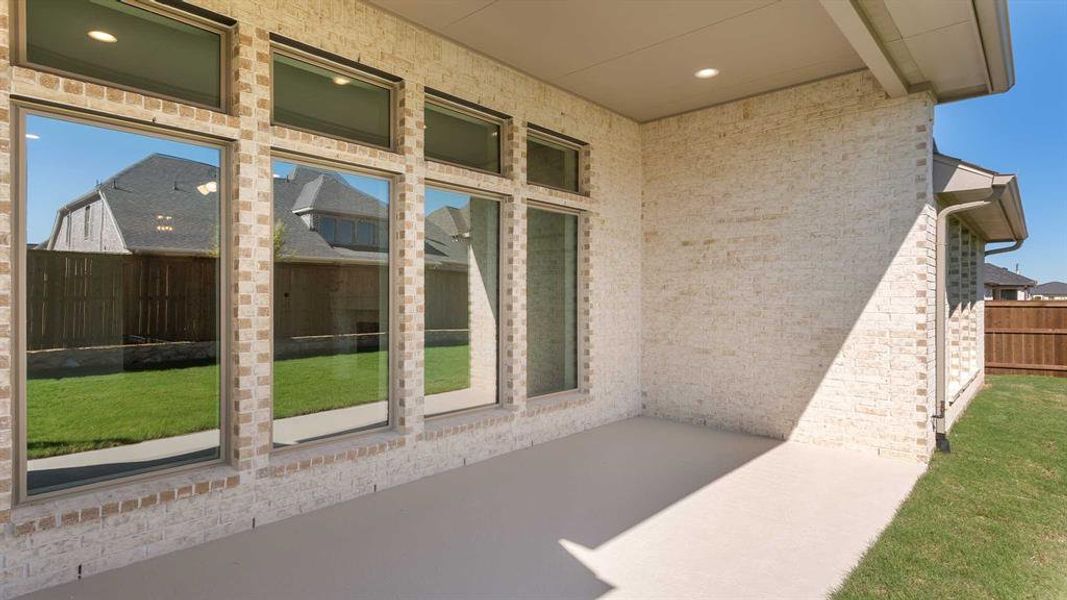 Exterior details and patio area of a home in North Sky 65', Celina (Image 2). Exterior details and patio area of a home in North Sky 65', Celina (Image 2).