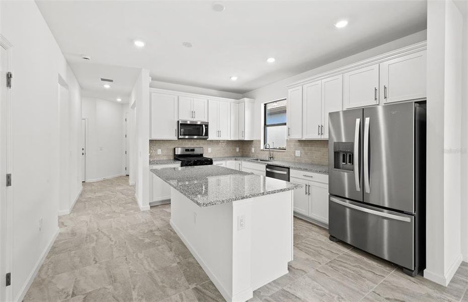 Furnished interior view inside a new home in Arbor Oaks, North Port (Image 8). Furnished interior view inside a new home in Arbor Oaks, North Port (Image 8).