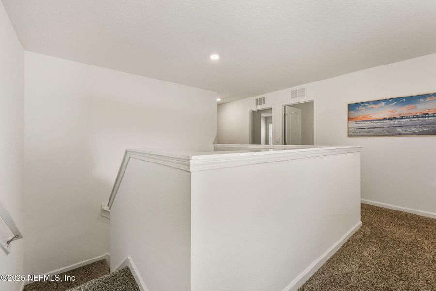 Furnished interior view inside a new home in Ravenswood Village, St. Augustine (Image 32).