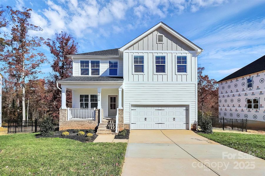 Front exterior of a new home in , Monroe, NC, highlighting curb appeal (Image 1). Front exterior of a new home in , Monroe, NC, highlighting curb appeal (Image 1).