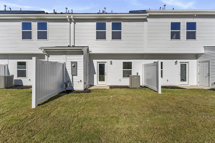 Exterior details and patio area of a home in Edwards Station, Taylors (Image 2).