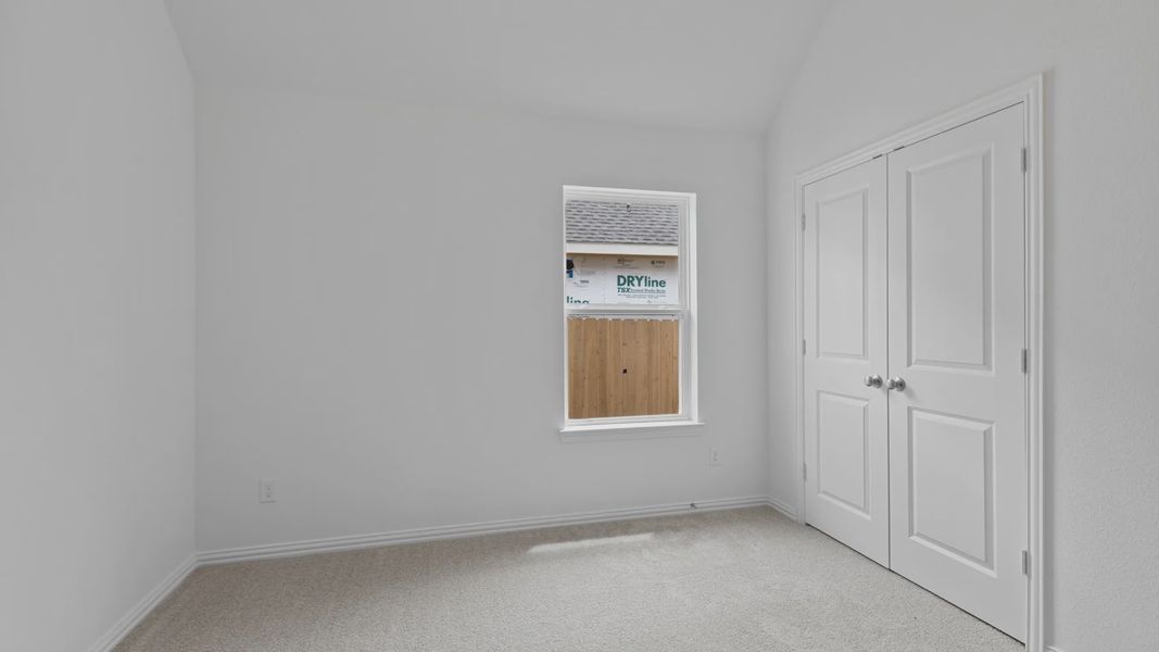 Furnished interior view inside a new home in Sunterra, Katy (Image 6).