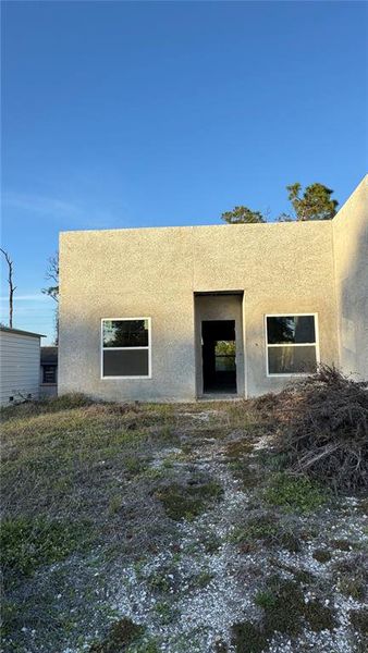 Exterior details and patio area of a home in , Port Charlotte (Image 6).
